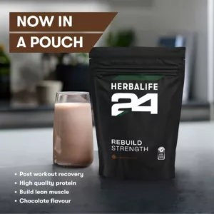 Herbalife24 Rebuild Strength product image showing glass of made product next to bag of product, designed for athletes post-workout recovery.